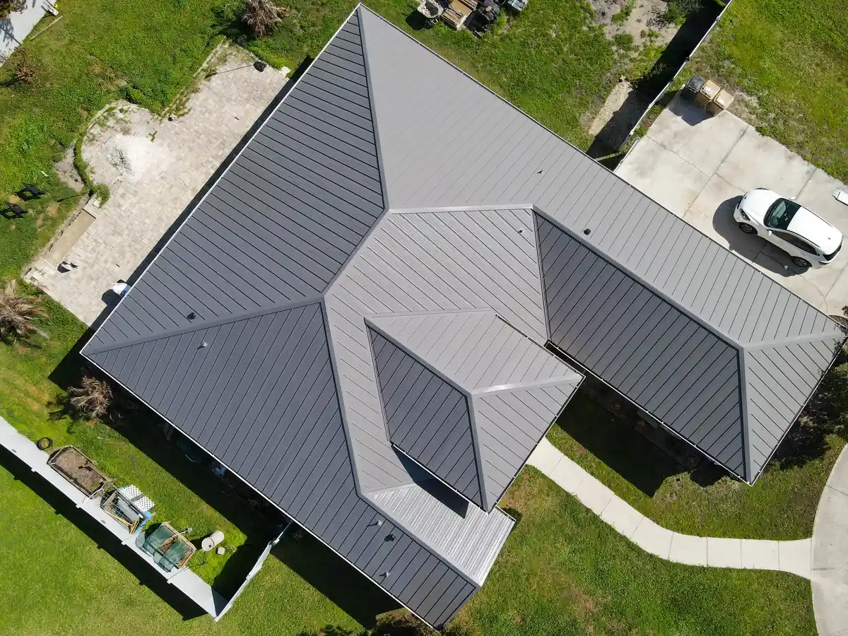 Aerial view of the finished grey standing seam metal roof in Kissimmee, Florida