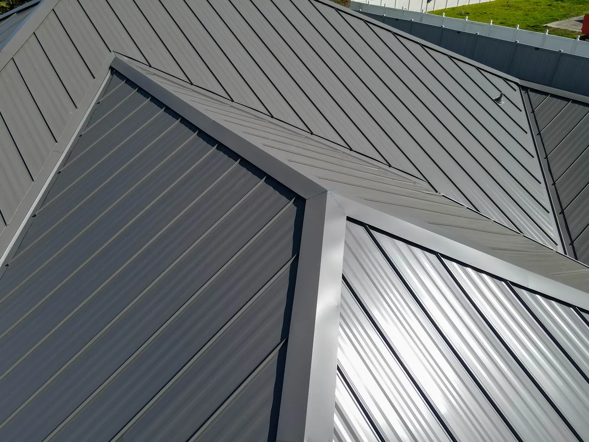 Close drone view of the grey standing seam metal roof in Kissimmee, Florida