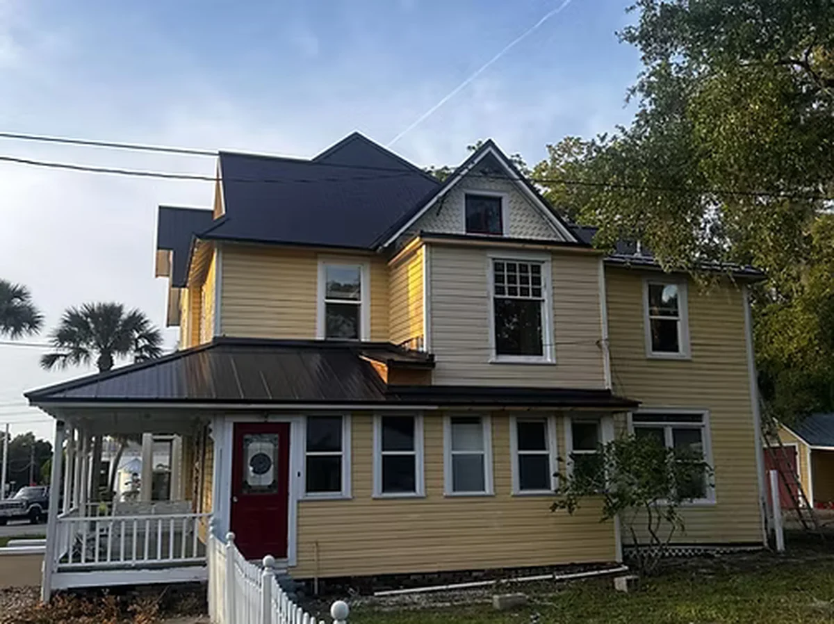 Black patio metal roof in Sanford, Florida